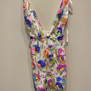 Flower backless mini sparkle dress.